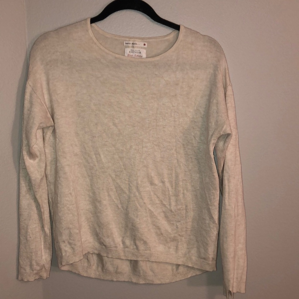 Cream sweater.